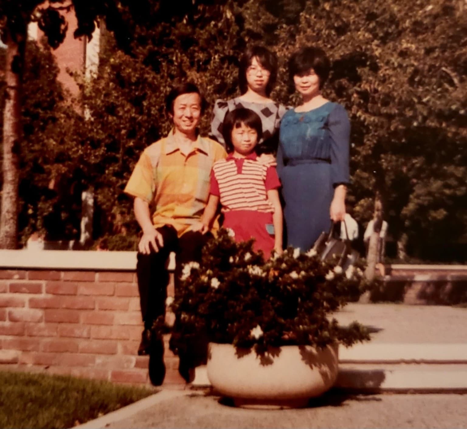 Ye Guozhi with his family at a picnic held by the oil-services company where he worked